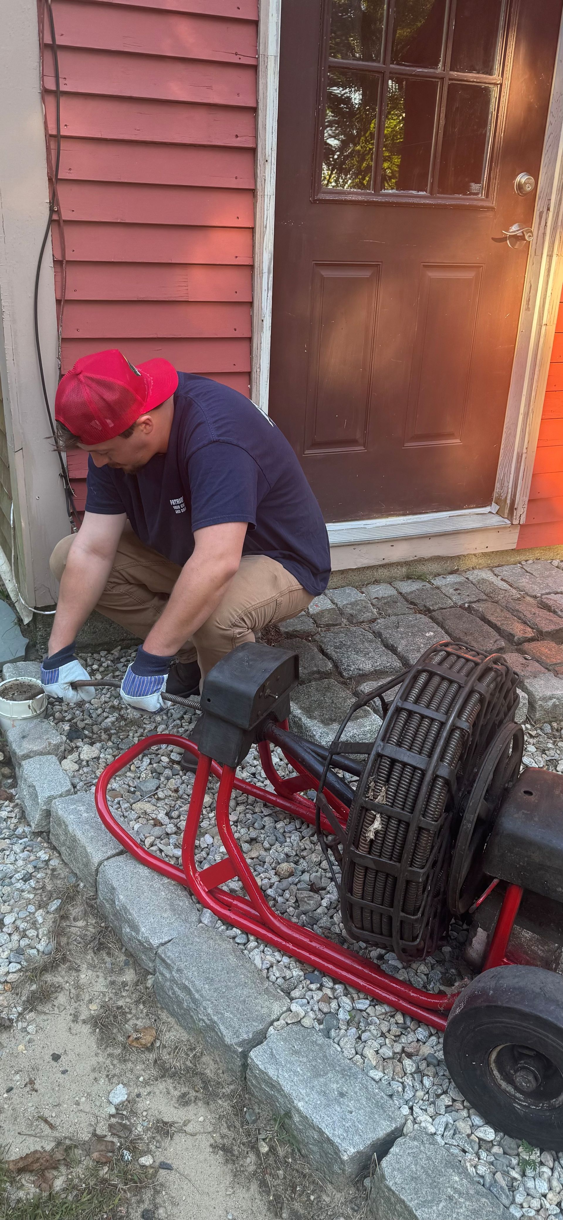 Drain cleaning service performed by Patriot Services technician